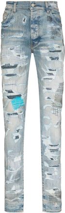Amiri distressed-finish skinny jeans - men - Elastodiene/Spandex/Elastane/Cotton - 31 - Blue