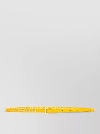 Prada skinny eyelet belt featuring gold tone hardware