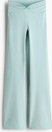 H&M Ausgestellte Yogaleggings mit SoftMove - Turquoise