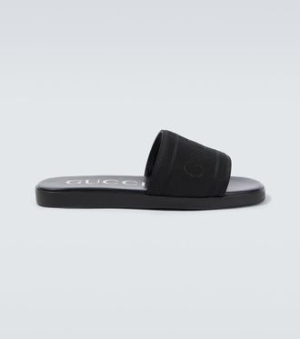 Gucci Logo canvas and leather slides