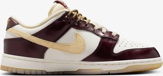 Nike Womens Dunk Low Lx Year Of The Snake Shoes In Sail/burgundy Crush/team Gold