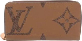Louis Vuitton Pre-owned Wallets, female, Brown, Size: ONE SIZE Pre-owned Plastic wallets