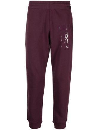 Moschino Pantaloni sportivi con stampa - Rosso