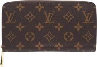 Louis Vuitton Pre-owned Monogram Lange Portemonnee (bi-fold) - Dames - Vintage Accessoires - Bruin - ONE Size - Vintage
