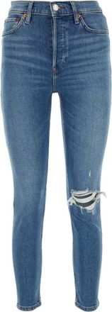 Re/Done logo-patch ripped jeans - women - Polyester/Cotton/Elastomultiester/Elastane - 25 - Blue