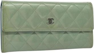 Chanel Pre-owned Wallets, female, Green, Size: ONE SIZE Pre-owned Coated Canvas Wallet