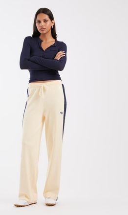adidas Originals pantaloni della tuta lavorati a maglia Firebird color crema-Bianco
