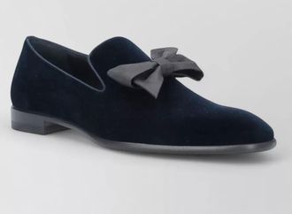 Christian Louboutin velvet loafers featuring signature bow detail