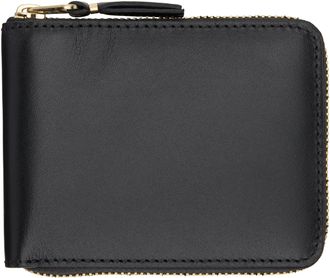 Comme des Garçons Compact Wallet Leather Comme Des Garçons compact leather zip around wallet from