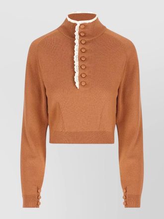 Chlo&eacute; pullover lace trim high neck buttons