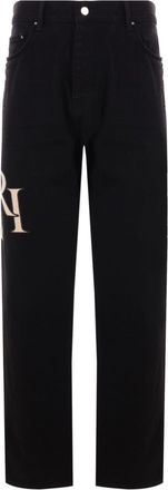 Amiri Staggered Logo Jeans - men - Cotton - 32 - Black