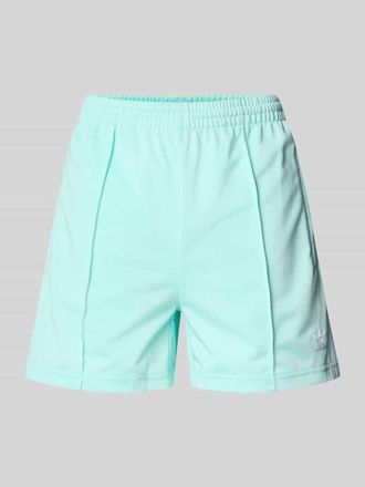 adidas Originals Relaxed Fit Shorts mit Rei&szlig;verschlusstaschen Modell FIREBIRD in Hellblau, Gr&ouml;&szlig;e M