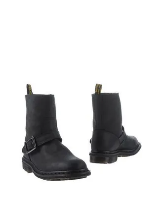 Dr. Martens CALZATURE - Stivaletti su YOOX.COM