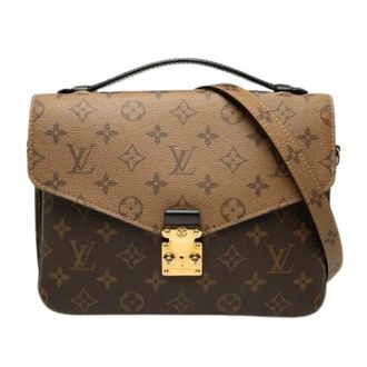 Louis Vuitton Pre-owned Pochette Metis - Dames - Pre-owned - Bruin - Maat: ONE Size Leer