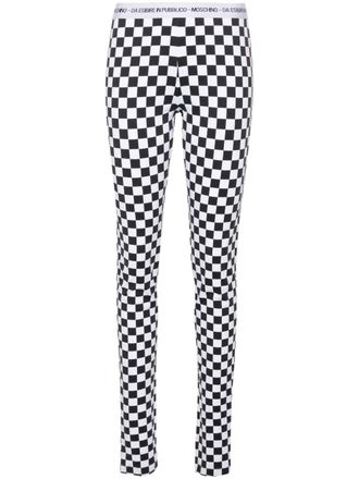 Moschino checkerboard-print flared trousers - women - Elastane/Polyamide - 36 - White