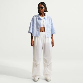 Nike Womens Nike Sportswear Mid-Rise Lightweight UV Pants in White | IO3376-133