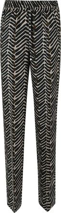Kiton abstract-pattern trousers - women - Silk - 44 - Black