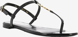 Saint Laurent Flache Sandalen aus Lackleder mit Monogramm Cassandra 05