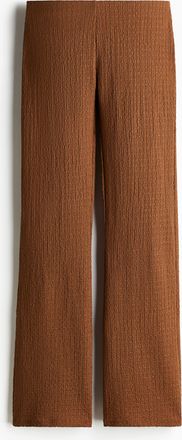 H&M Ausgestellte Hose aus Crinkle-Jersey - Beige