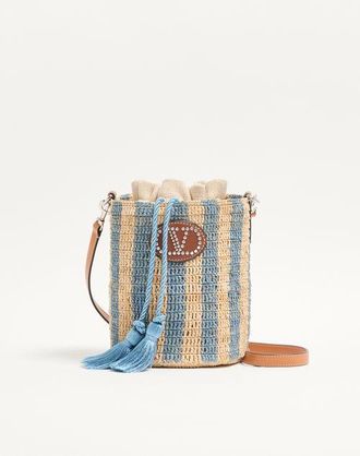Valentino Garavani Valentino Garavani small striped raffia bucket bag Wo
