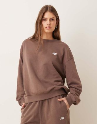 New Balance Sport Essentials - Felpa girocollo marrone in tessuto french terry