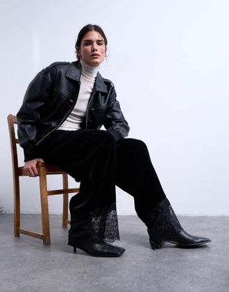 Topshop Pantaloni in velluto neri con inserto in pizzo-Nero