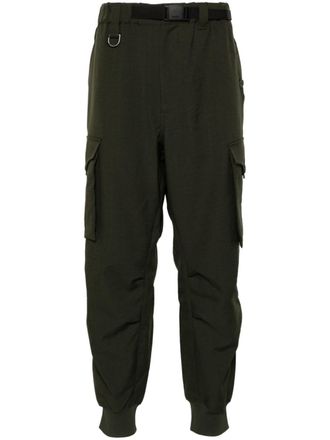 Yohji Yamamoto logo-print trousers - men - Recycled Polyester/Polyamide/Cotton/Elastane - M - Green