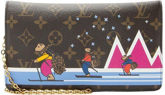 Louis Vuitton Brown Limited Edition Monogram Canvas Christmas Animation Pochette (Authentic Pre-Loved)