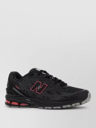 New Balance mesh sneakers featuring signature rubber outsole