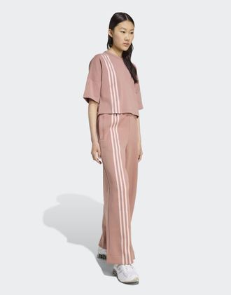 adidas Originals Pantaloni ampi color argilla caldo con 3 strisce laterali-Marrone