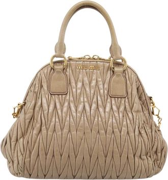 Miu Miu Convertible Dome Satchel Matelasse Leather Beige Leather Handbag (Pre-Owned)