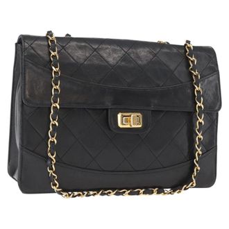 Chanel Vintage Mademoiselle Lock Trapezoid Flap Quilted Lambskin Black Leather Handbag (Pre-Owned)
