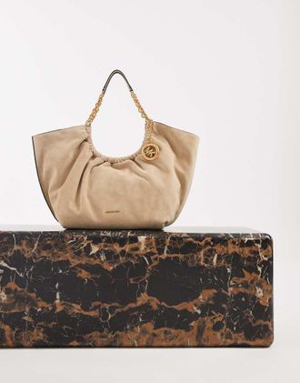 Michael Kors borsa tote grande Indie con coulisse in kaki chiaro-Bianco