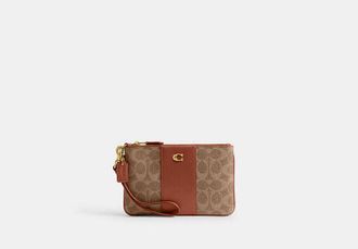 Coach Essential Small Wristlet In Signature Canvas