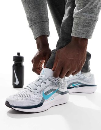 Nike Winflo 11 sneakers in white and blue