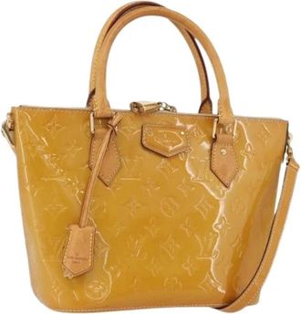 Louis Vuitton Pre-owned Handbags, female, Yellow, Size: ONE SIZE Pre-owned Montebello PM Hand Bag