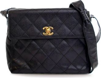 Chanel 1996-1997 CC gewatteerde Caviar crossbodytas met draaislot - Zwart