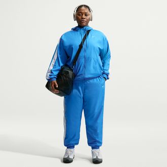 Nike Womens Nike Sportswear Classic Wovens UV Protection Mid-Rise Loose Jogger Pants (Plus Size) in Blue | HF9200-435