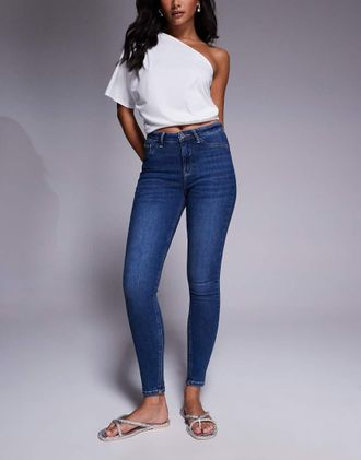 River Island Jeans skinny modellanti a vita medio alta blu lavaggio scuro