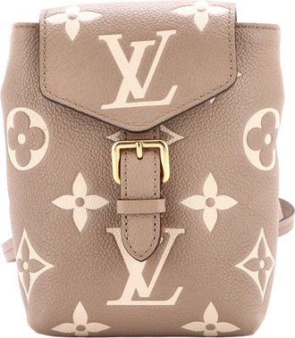 Louis Vuitton Tiny Backpack Bicolor Monogram Empreinte Giant (Authentic Pre- Loved)