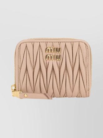 Miu Miu leather coin purse featuring quilted design
