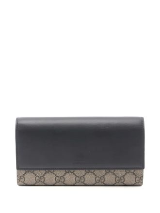 Gucci Portafoglio bi-fold GG Supreme - Nero