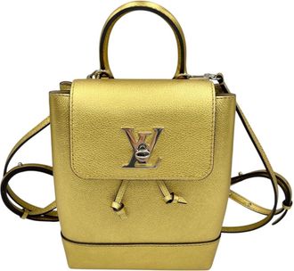 Louis Vuitton Gold Leather Backpack (Pre-Owned)