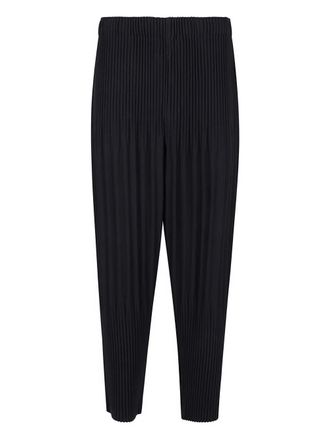 Homme Plissé Issey Miyake pleated pants - women - Polyester - III - Black
