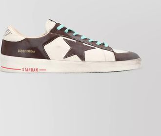Golden Goose star-shaped low-top sneakers featuring worn-out effect
