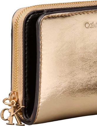 Calvin Klein Portafoglio color oro metallizzato con zip