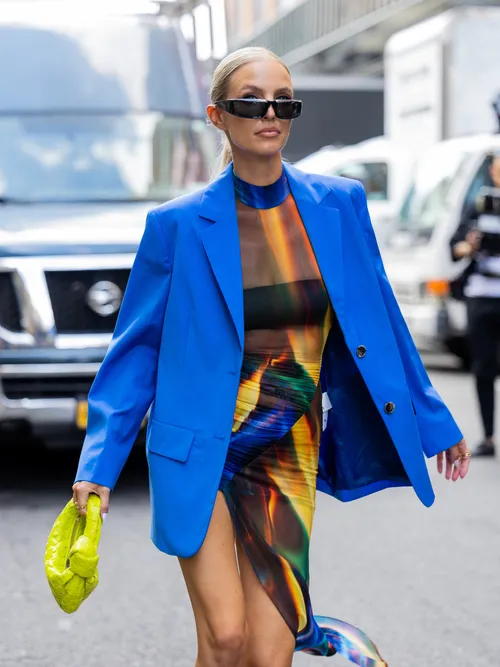 Leonia Hanne wears blue blazer and see through dress