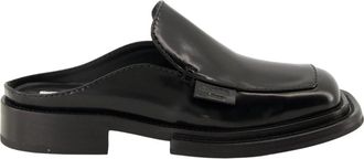 Moschino Leren Muiltjes- Elegant en Comfortabel - Dames - Slip ons - Zwart - 37 1/2 EU - Schoenen
