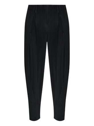 Homme Pliss&eacute; Issey Miyake pleated trousers - men - Polyester - 2 - Black