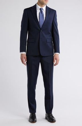 Calvin Klein Solid Two-Button Notched Lapel Slim Fit Suit in Navy at Nordstrom Rack, Size 36Regular